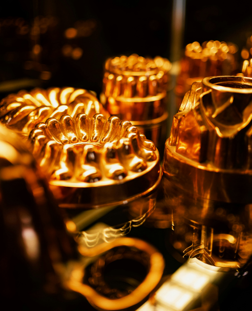 Image of a skilled jeweler crafting titanium gold jewelry