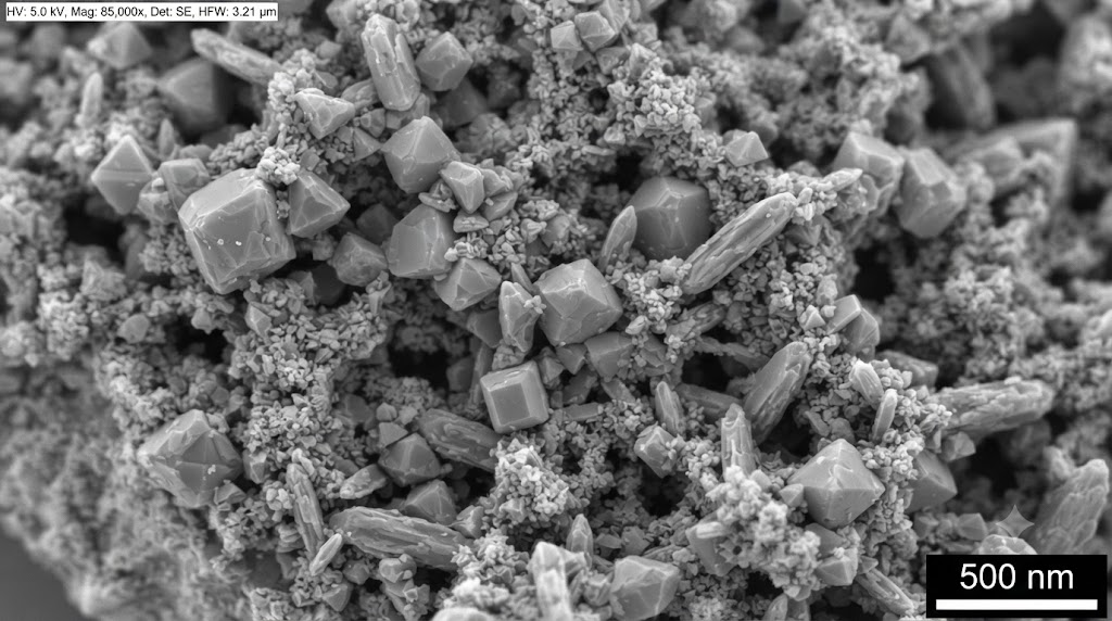 High-Resolution SEM Image of Iridium-Tantalum Coating Surface showing crystalline structure