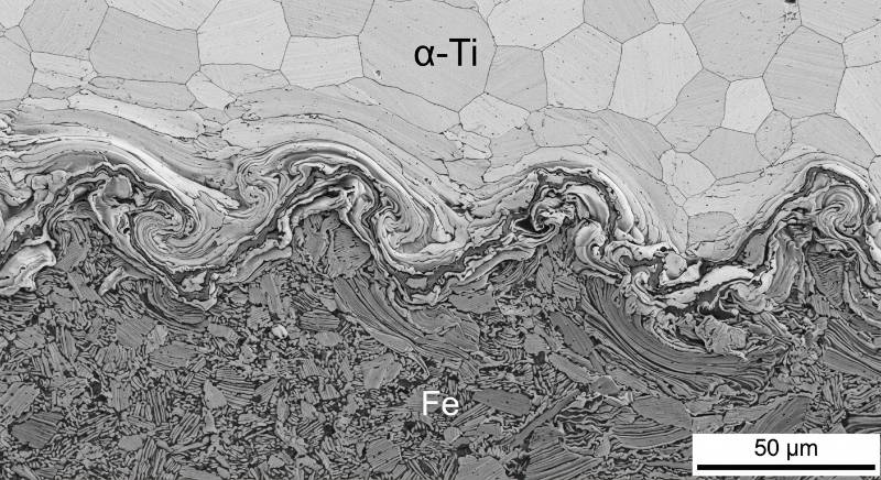 Microstructure Image: Titanium-to-Steel Explosion Cladding Interface